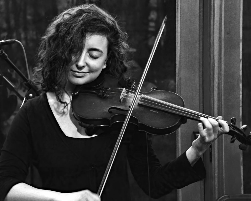 Lillie Pearlman performs with Ed Pearlman and Noah Fishman at the 4/16 event. Lillie Pearlman performs with Ed Pearlman and Noah Fishman at the 4/16 event.